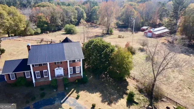 a view of the yard covered with snow