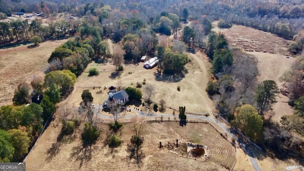 740 Patrick Ml Road Southwest Winder, GA 30680 - Photo 7 of 12 a view of the yard covered with snow