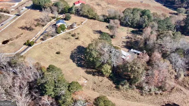 a view of a backyard of the house