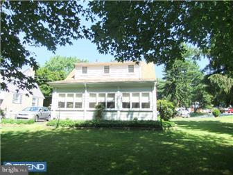 361 Garden Road Springfield, PA 19064 - Photo 11 of 12 a front view of a house with a garden