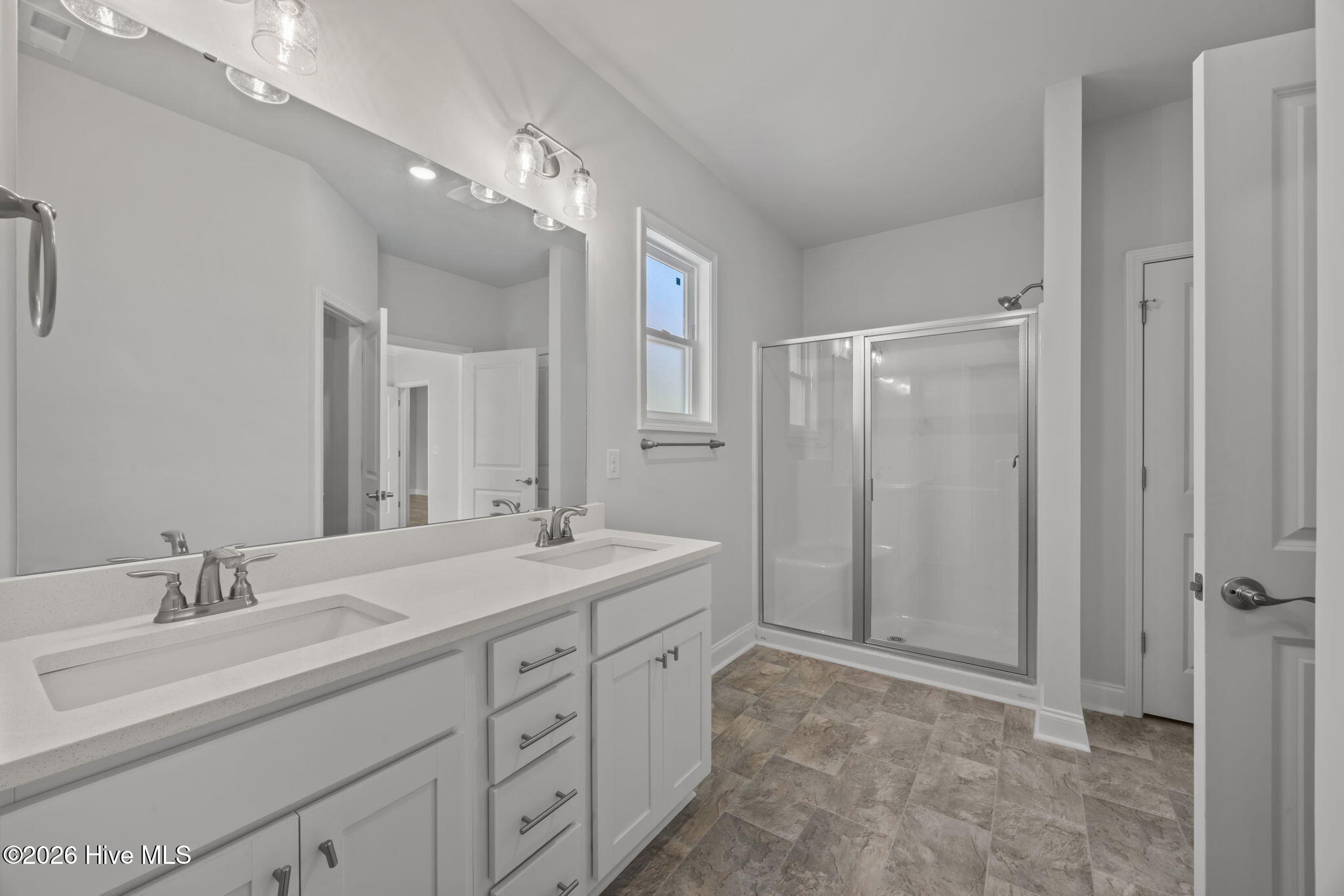 5708 Sloop Court New Bern, NC 28560 - Photo 19 of 90 5' shower- long double vanity- quartz countertops
