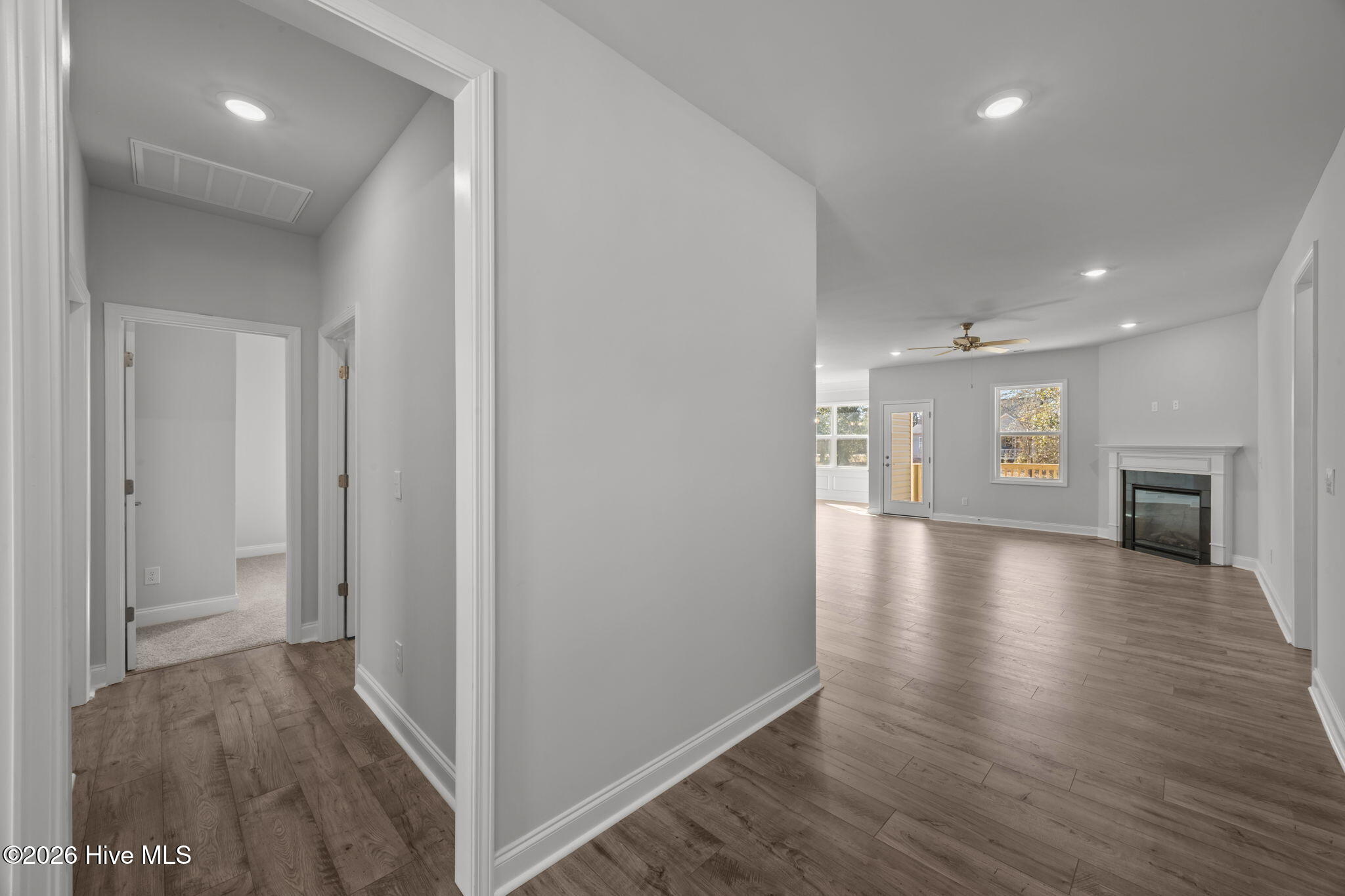 5708 Sloop Court New Bern, NC 28560 - Photo 5 of 90 hallway to the left with two bedrooms and Full Bathroom.