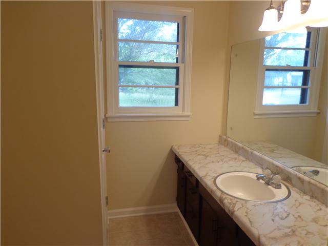 318 Jackson Road Portland, TN 37148 - Photo 11 of 18 Master Bath, New Tile Floor, New Combo Tub/Shower & New Toilet