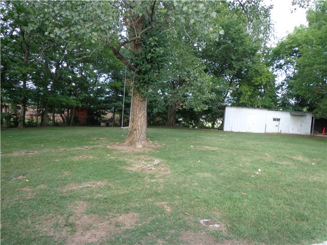 318 Jackson Road Portland, TN 37148 - Photo 18 of 18 Beautiful Backyard w/ Mature Shade Trees & Workshop