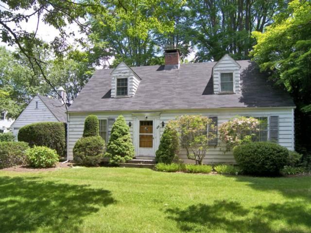 488 Sturges Road Fairfield, CT 06824 - Photo 1 of 1 a front view of a house with garden