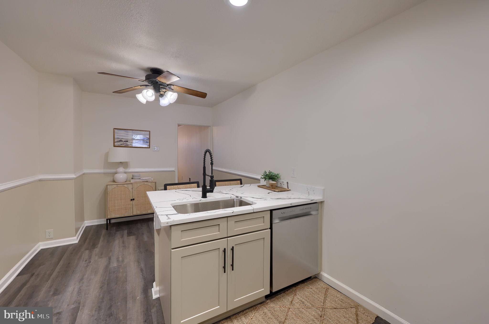 528 High Street Lancaster, PA 17603 - Photo 15 of 32 a kitchen with a sink dishwasher and white cabinets