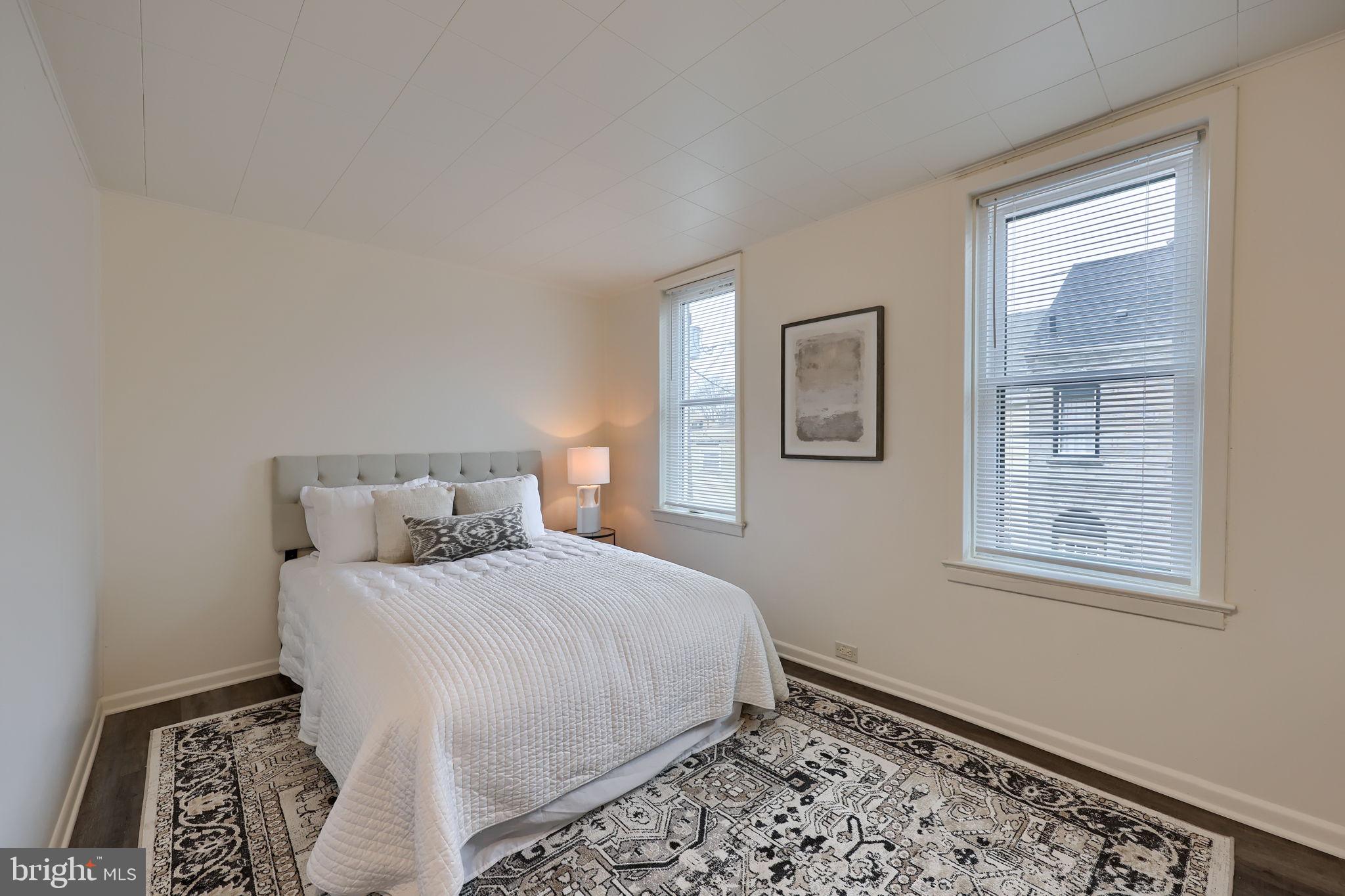 528 High Street Lancaster, PA 17603 - Photo 17 of 32 a bedroom with a bed and a window