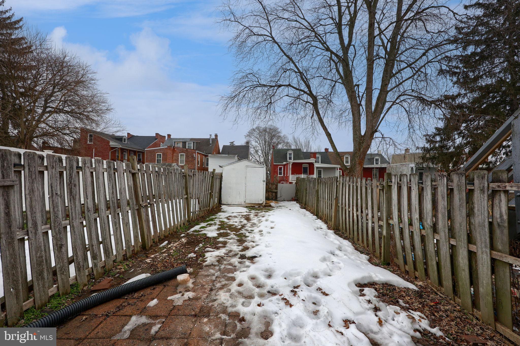 528 High Street Lancaster, PA 17603 - Photo 29 of 32 a view of a pathway with a wrought fence