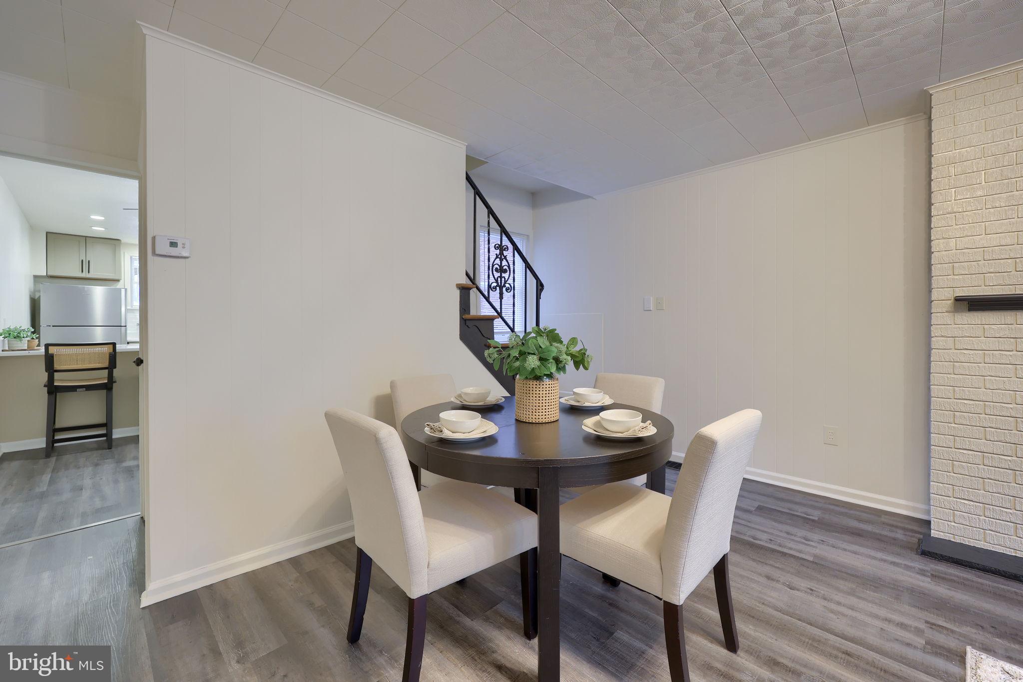 528 High Street Lancaster, PA 17603 - Photo 6 of 32 a view of a dining room with furniture and wooden floor