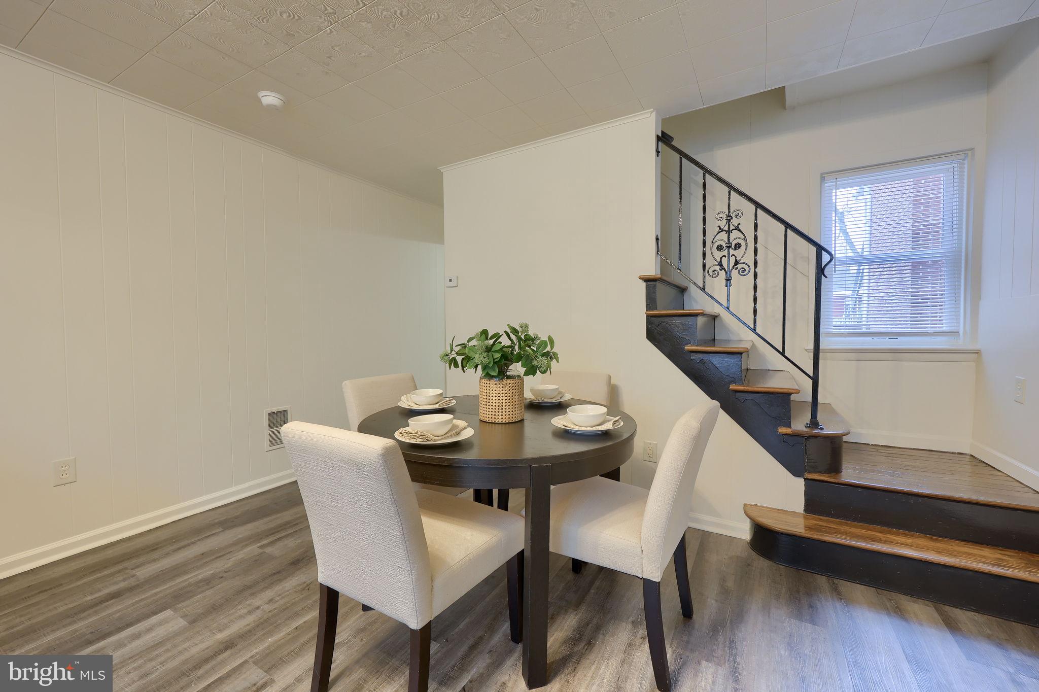 528 High Street Lancaster, PA 17603 - Photo 7 of 32 a view of a dining room with furniture and wooden floor
