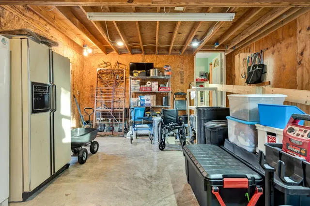 a view of a balcony with wooden floor and outdoor space
