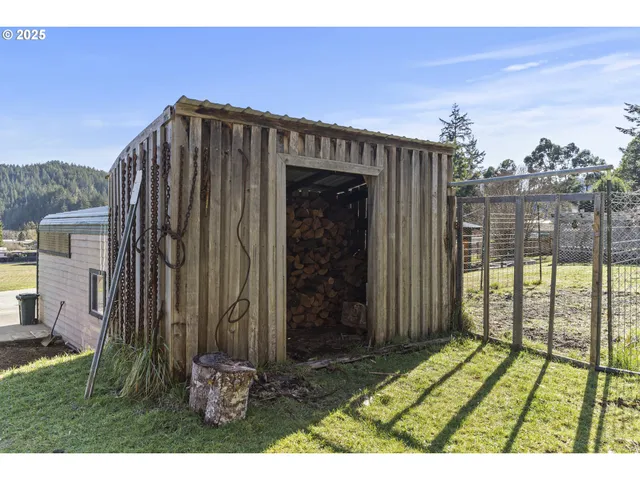 a view of a swimming pool with a yard