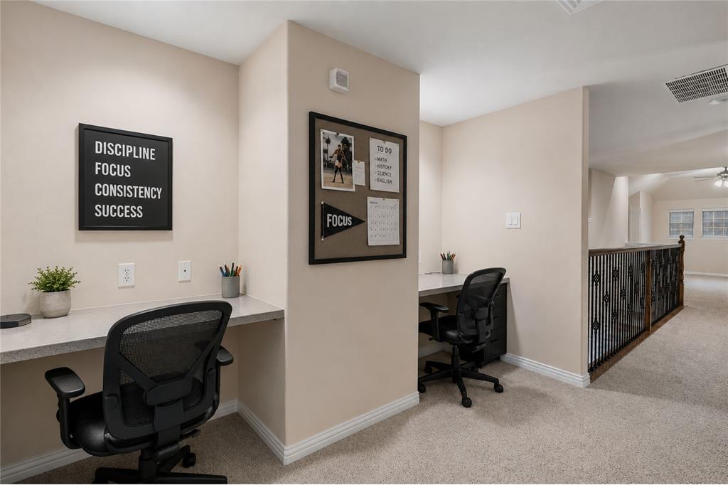 295 Stone Ridge Drive Sunnyvale, TX 75182 - Photo 21 of 38 upstairs hallway w built in desks lvl 2 virtually staged