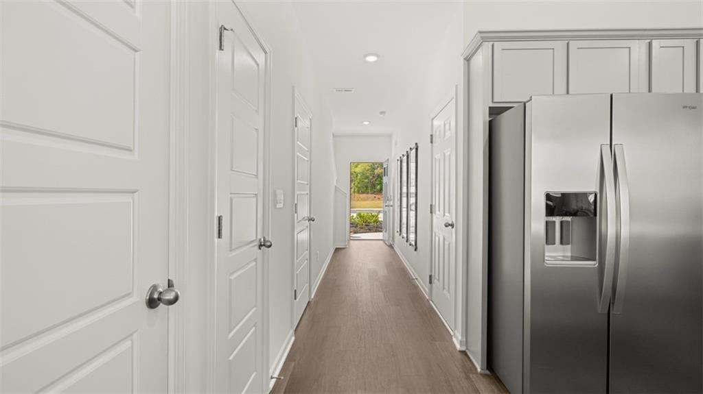 204 Kenmore Circle Perry, GA 31069 - Photo 19 of 47 a view of a bathroom with a glass shower door