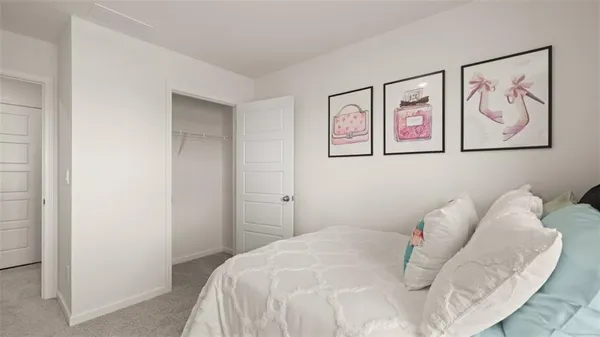 a bedroom with a bed and wall painting