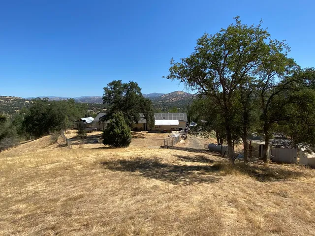 a view of a road with a building in the background