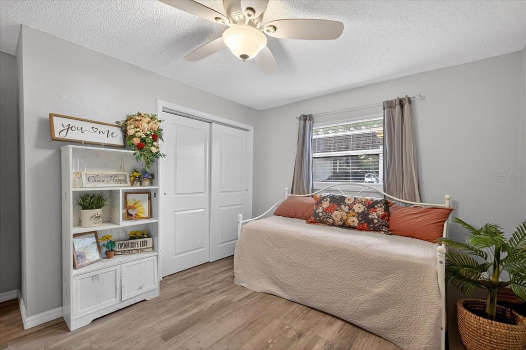 3230 Teeside Drive New Port Richey, FL 34655 - Photo 19 of 32 a bedroom with bed and window