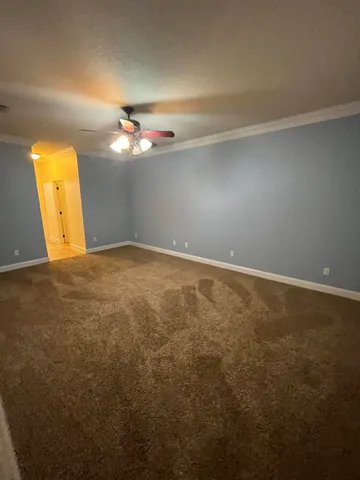 a view of storage and utility room with closet