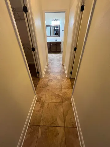 a white bath tub sitting in a bathroom