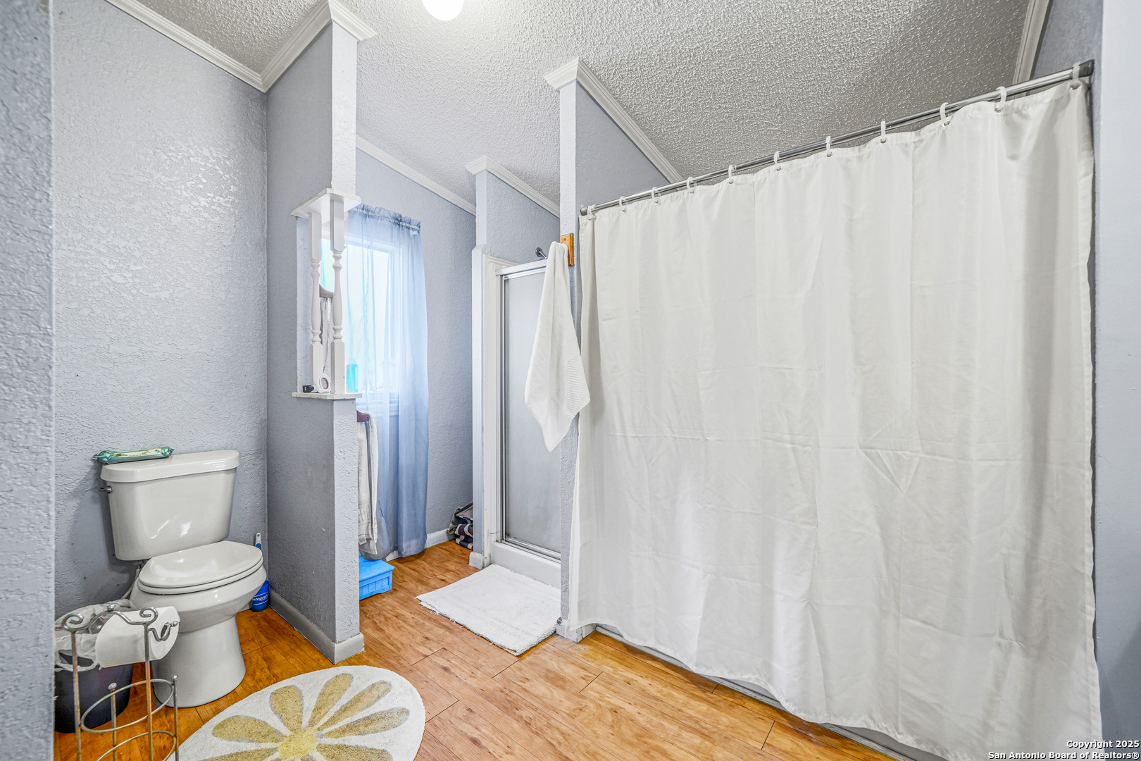 927 County Road 6846 Lytle, TX 78052 - Photo 17 of 21 a bathroom with a sink and a toilet