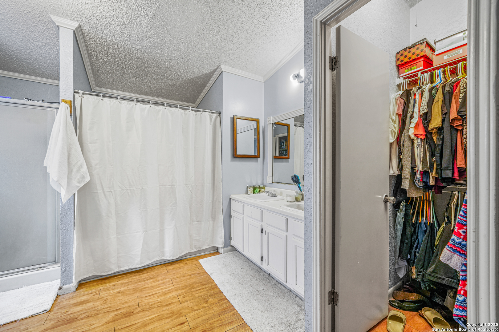 927 County Road 6846 Lytle, TX 78052 - Photo 18 of 21 a view of a walk in closet