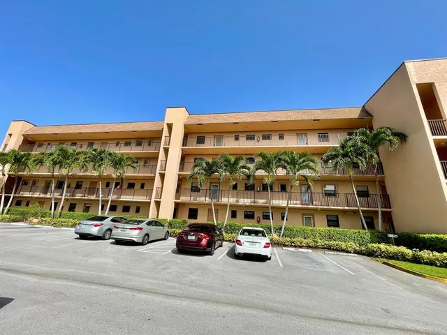 a view of balcony with wooden floor and stairs