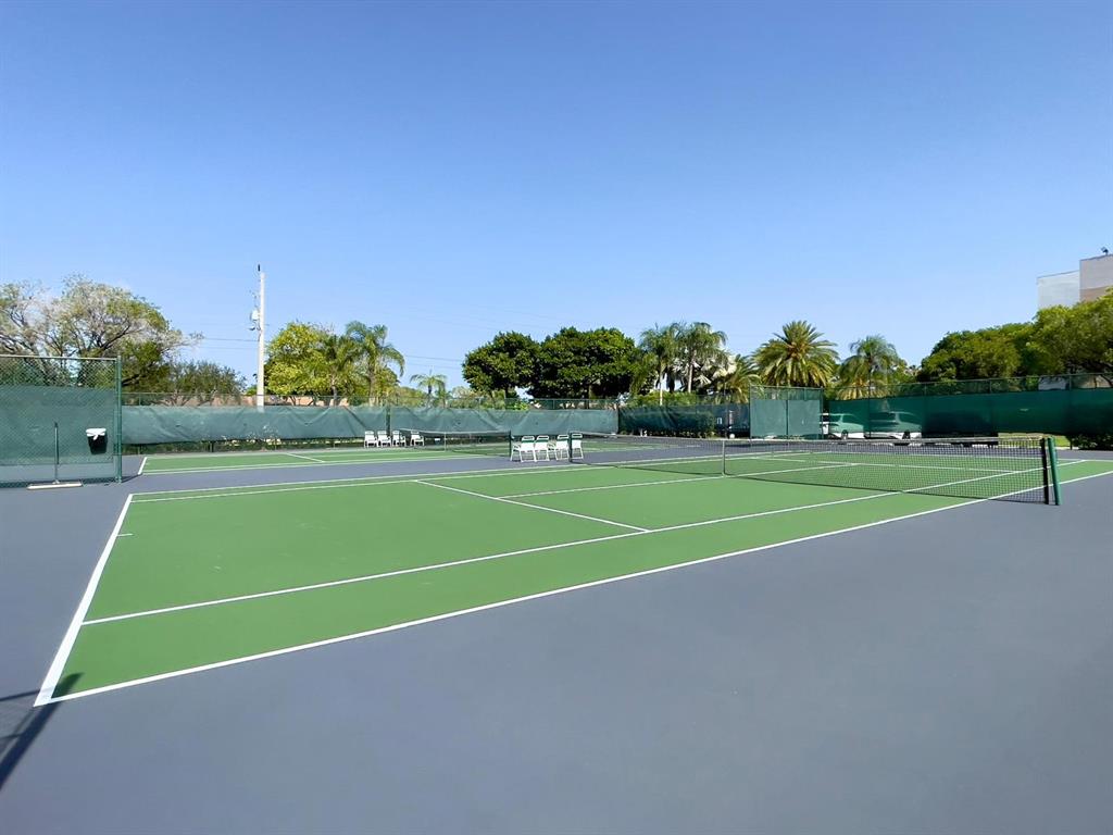 10444 Northwest 30th Court, Unit 409 Sunrise, FL 33322 - Photo 25 of 28 a view of a tennis court