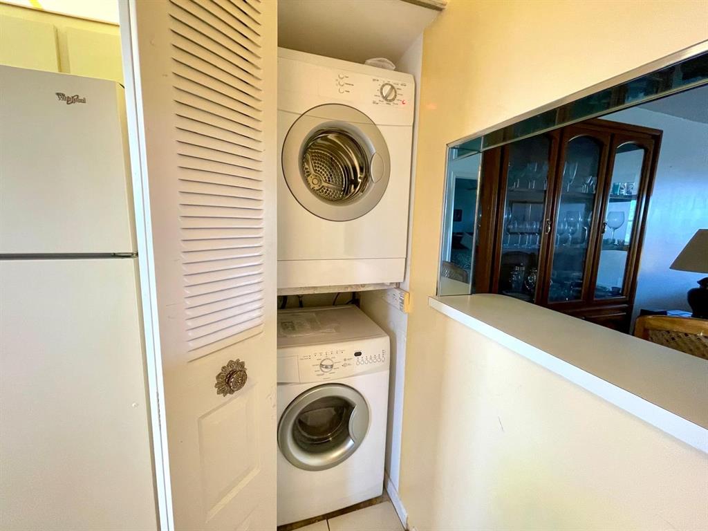 10444 Northwest 30th Court, Unit 409 Sunrise, FL 33322 - Photo 6 of 28 a utility room with dryer and washer