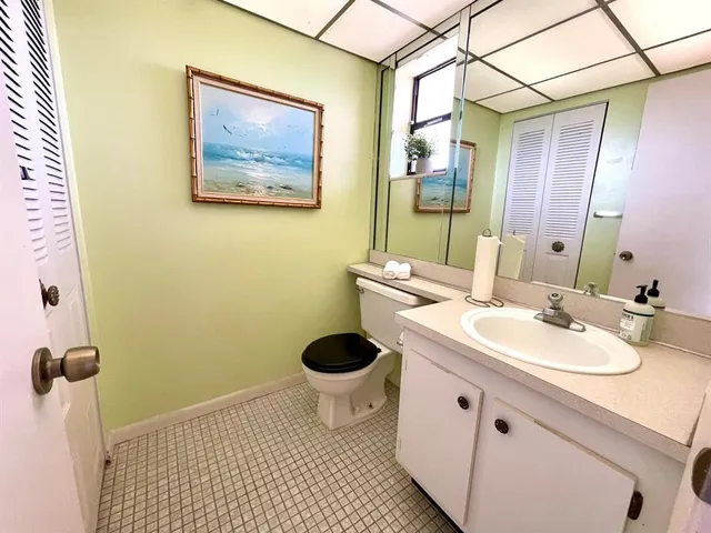 a very nice looking dining room with a table and chairs