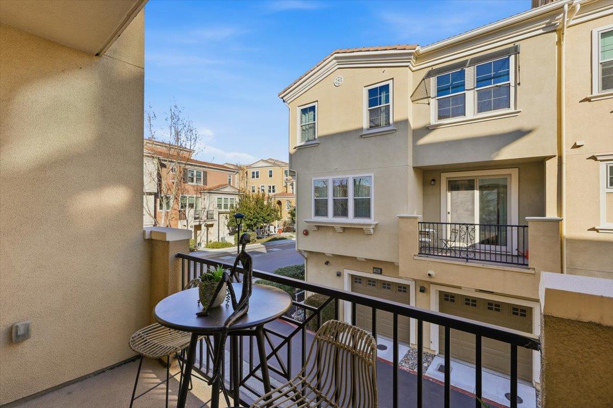 1989 Trento Loop Milpitas, CA 95035 - Photo 12 of 32 a balcony with table and chairs