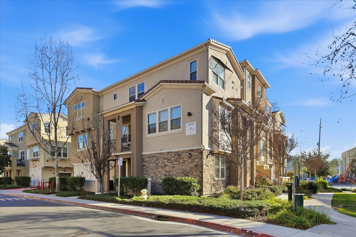 1989 Trento Loop Milpitas, CA 95035 - Photo 2 of 32 a front view of a building