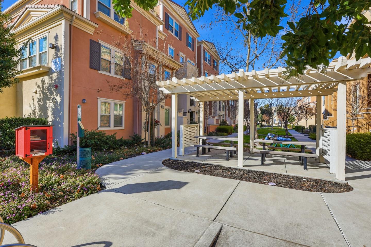 1989 Trento Loop Milpitas, CA 95035 - Photo 25 of 32 a view of a building with a patio
