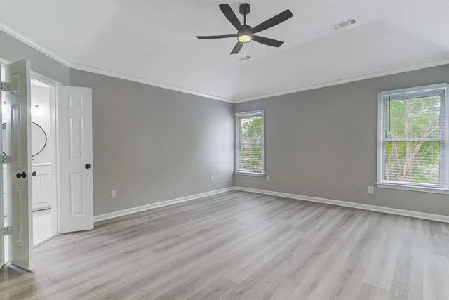 a view of an empty room and window