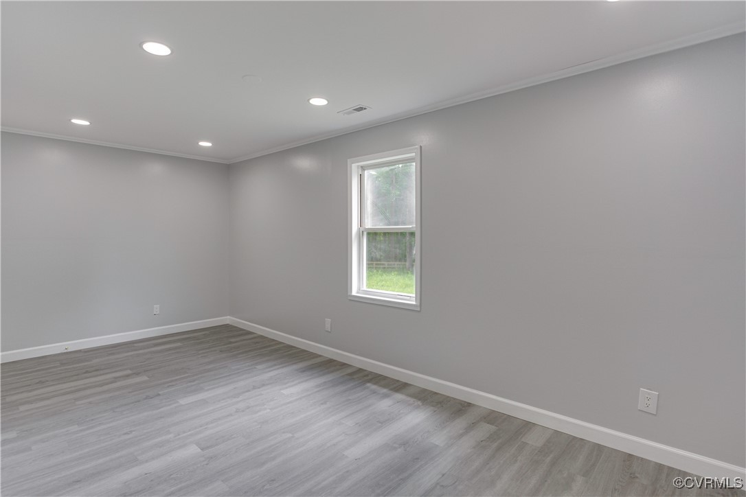 17072 Gun Barrel Road Montpelier, VA 23192 - Photo 24 of 43 Spare room featuring recessed lighting, light wood