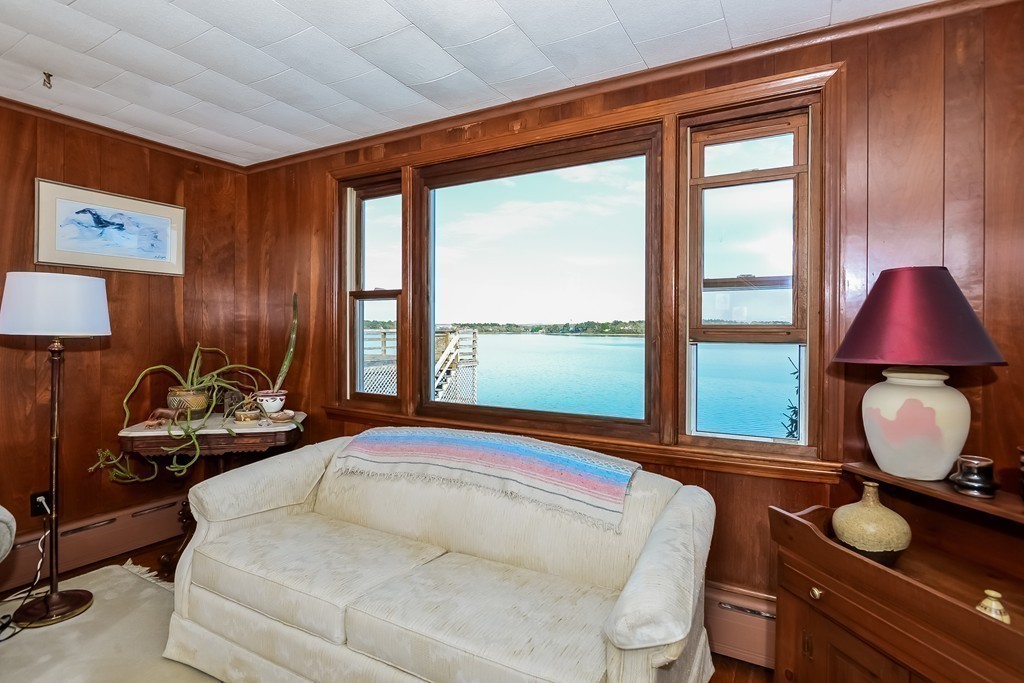 51 Pine Ridge Road Bourne, MA 02532 - Photo 15 of 25 a room with furniture and a window