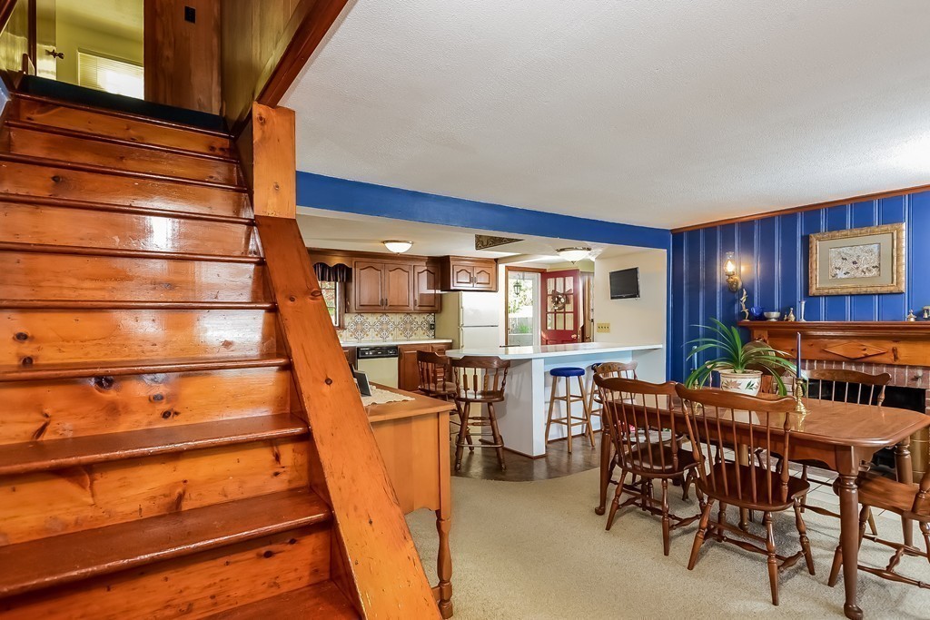 51 Pine Ridge Road Bourne, MA 02532 - Photo 17 of 25 a view of dinning room and chairs in a room