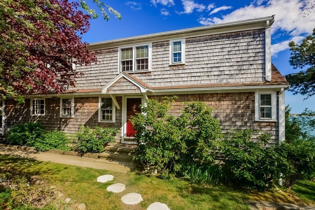 51 Pine Ridge Road Bourne, MA 02532 - Photo 25 of 25 a front view of a house with a yard
