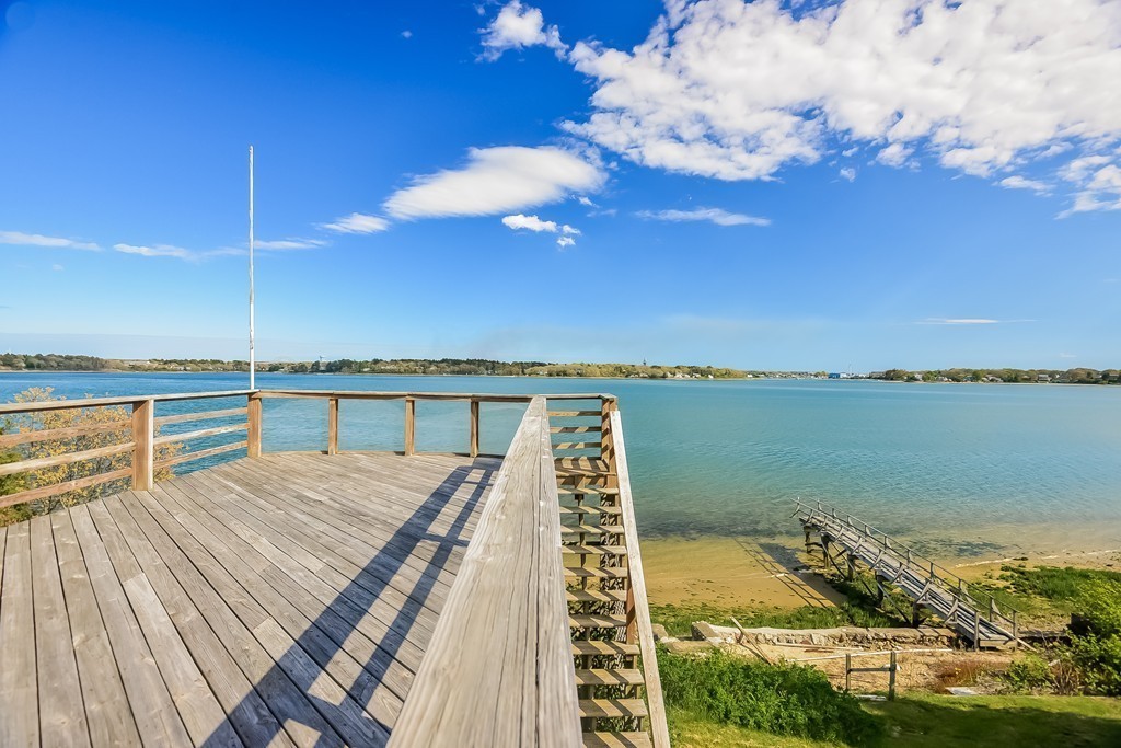 51 Pine Ridge Road Bourne, MA 02532 - Photo 3 of 25 a view of a balcony with an ocean