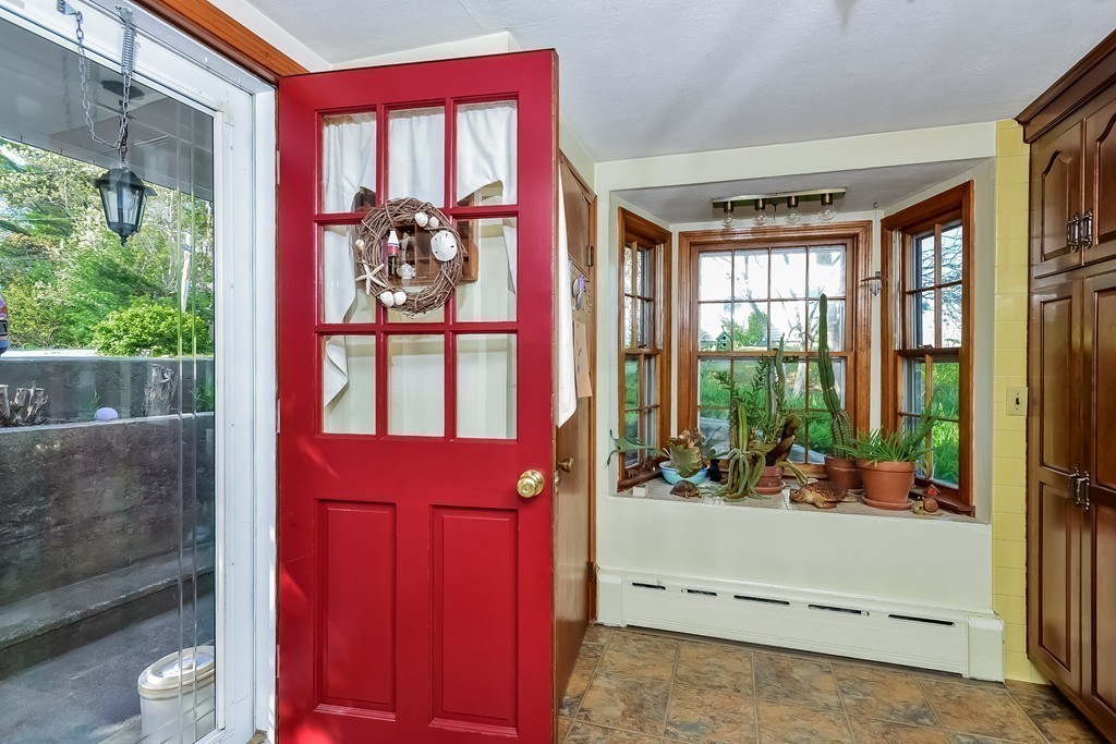 51 Pine Ridge Road Bourne, MA 02532 - Photo 5 of 25 a porch with a door and balcony