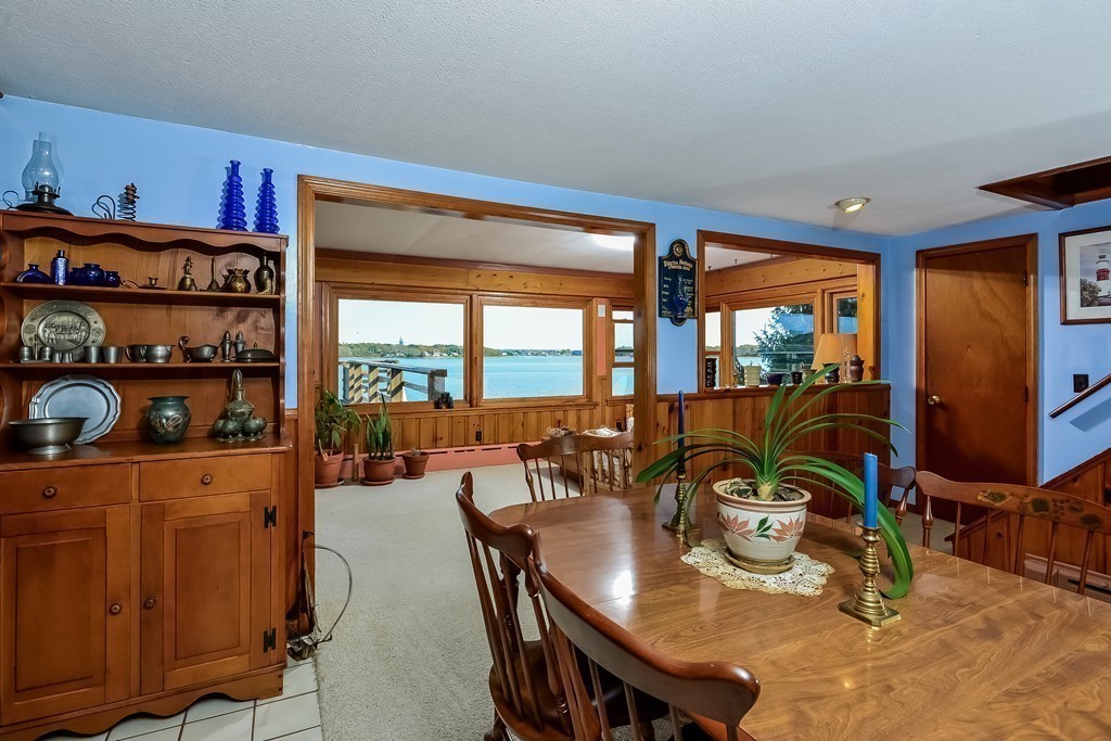 51 Pine Ridge Road Bourne, MA 02532 - Photo 8 of 25 a view of a dining room with furniture window and outside view