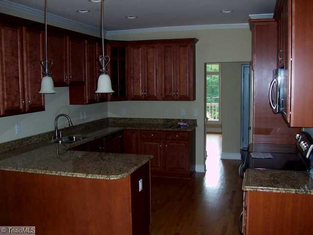 4174 Beckerdite Road Sophia, NC 27350 - Photo 4 of 8 Kitchen. Slide-in range/oven, Dishwasher, Microwave
