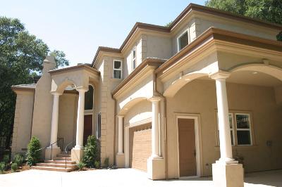 a view of a house with a potted plant