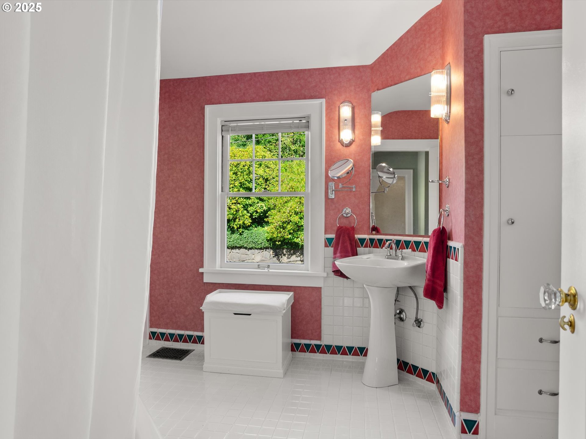 2917 Southwest Fairview Boulevard Portland, OR 97205 - Photo 14 of 25 a bathroom with a sink toilet and a mirror