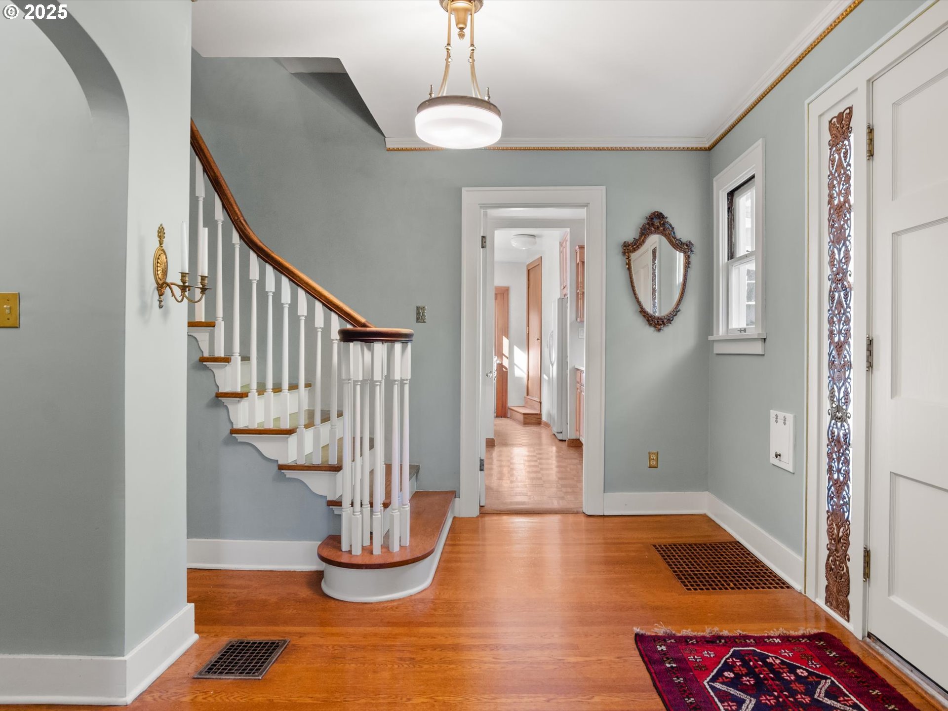 2917 Southwest Fairview Boulevard Portland, OR 97205 - Photo 2 of 25 a view of entryway with wooden floor