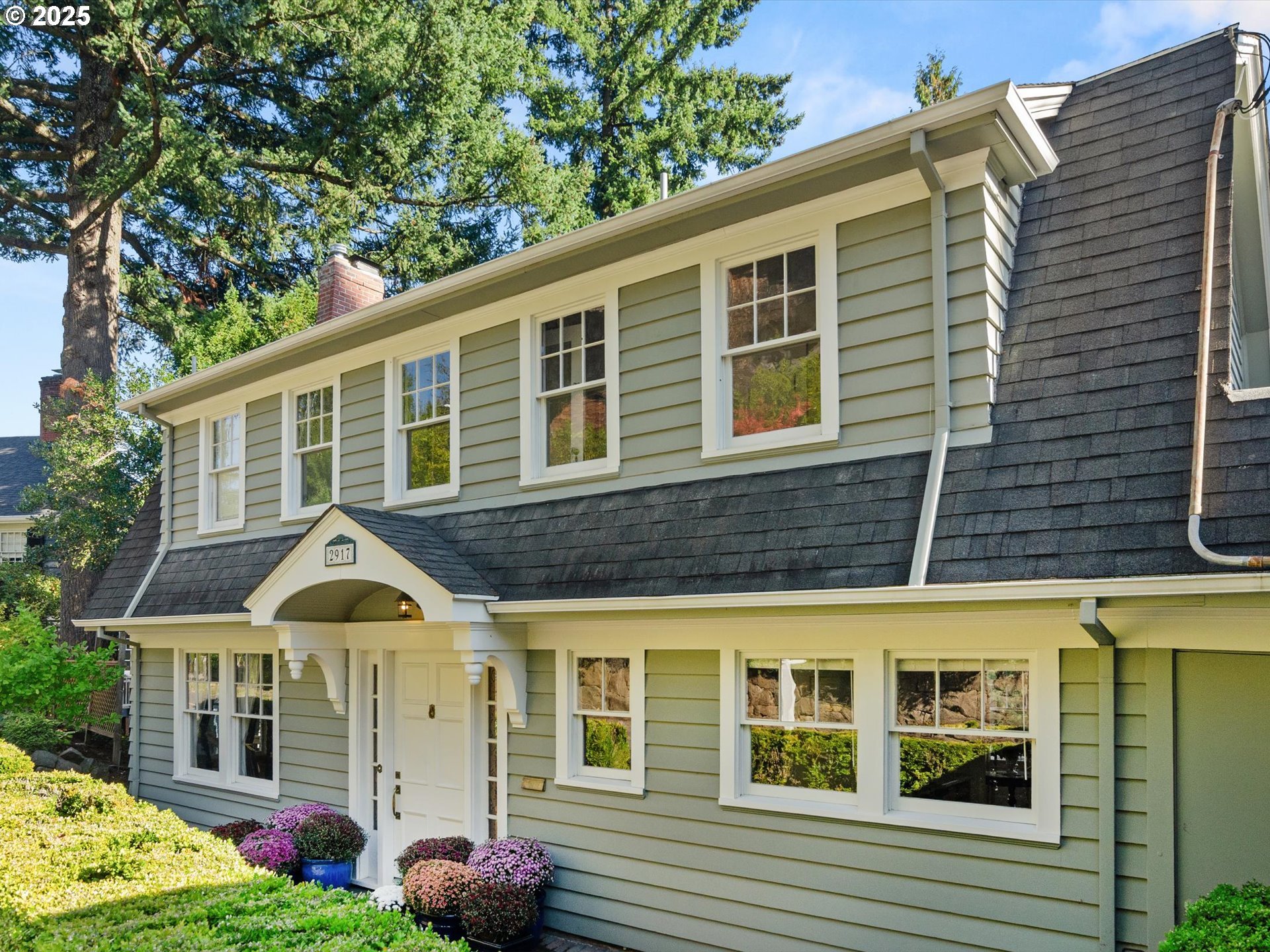 2917 Southwest Fairview Boulevard Portland, OR 97205 - Photo 21 of 25 a front view of a house with garden