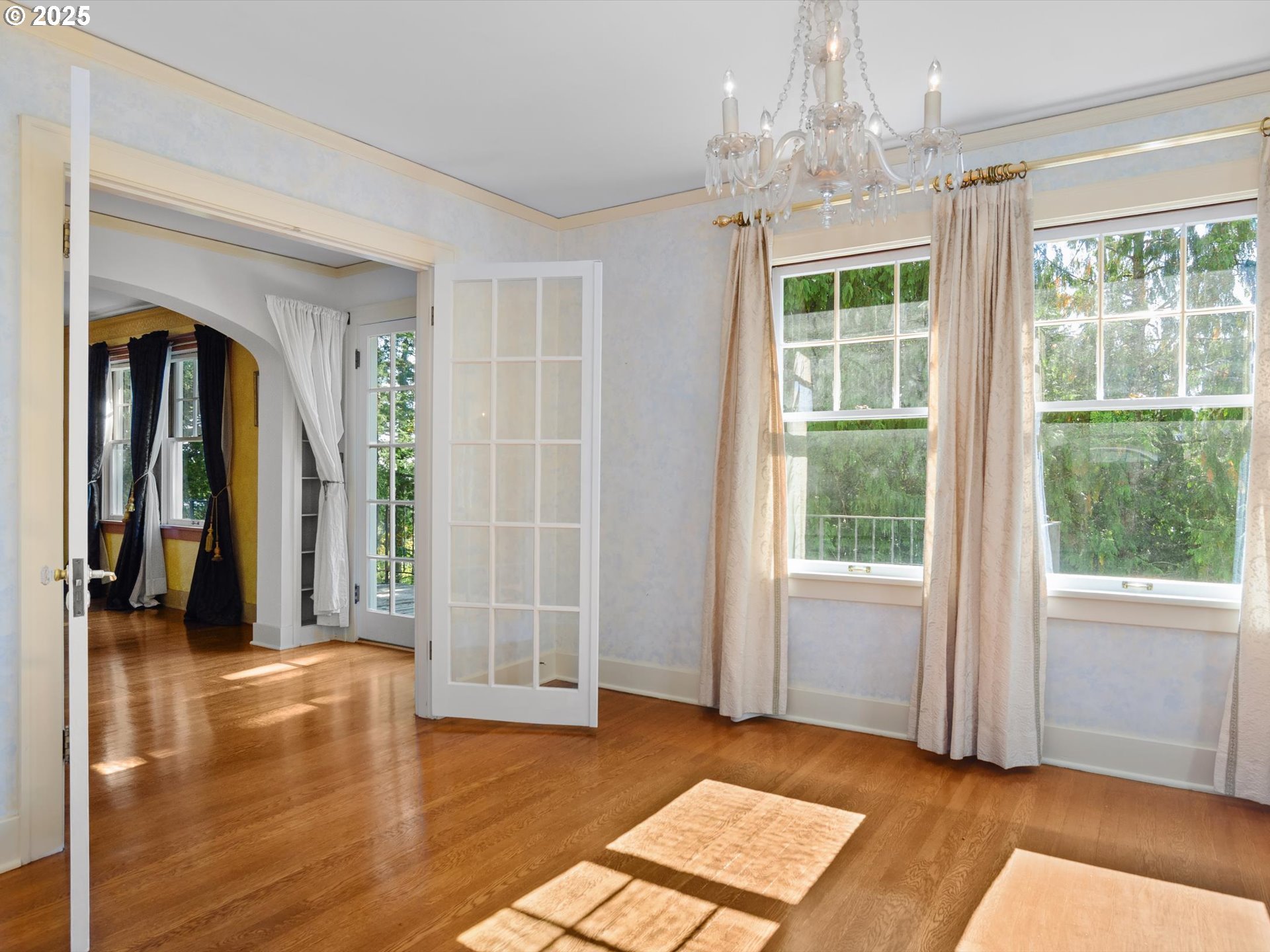 2917 Southwest Fairview Boulevard Portland, OR 97205 - Photo 8 of 25 a view of livingroom with furniture wooden floor and windows