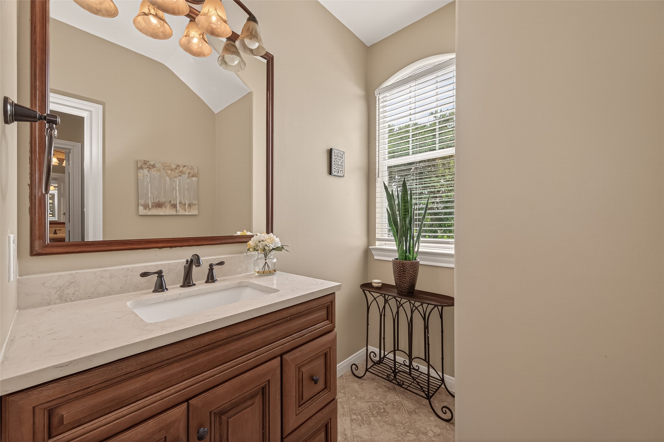 2319 Braer Ridge Drive Katy, TX 77494 - Photo 32 of 50 a bathroom with a sink a mirror and a window