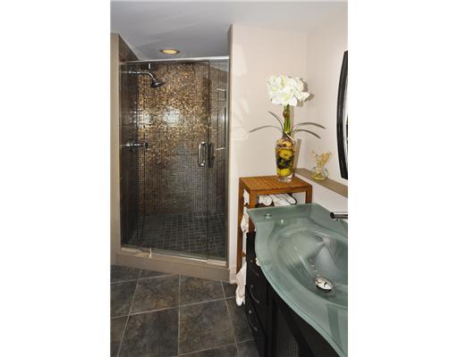 302 Wildberry Road Fox Chapel, PA 15238 - Photo 11 of 18 Master Bath/Spa. The spa-like master bath includes two glass-bowl vanities and an oversize tiled shower with bench.