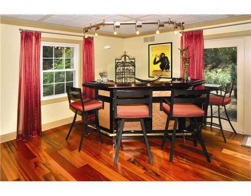 Family Room. The  bar area" is a focal point in the Family Room with surround sound speaker system.