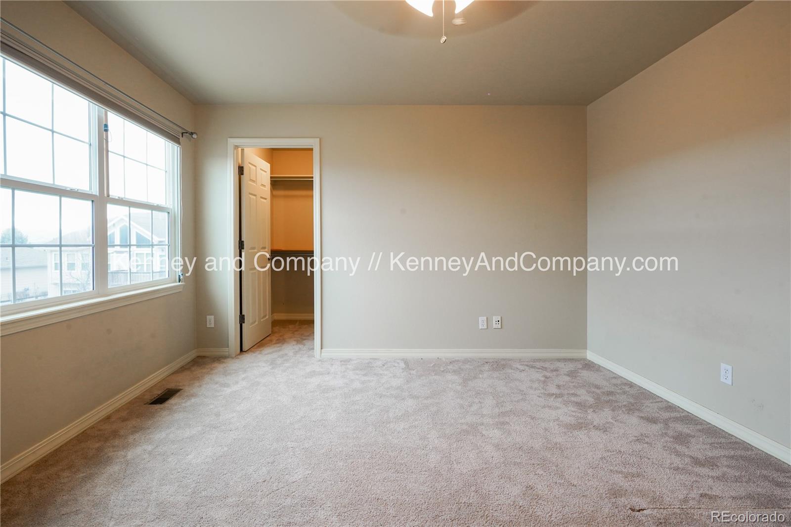 15879 Agate Creek Drive Monument, CO 80132 - Photo 17 of 24 wooden floor in an empty room with a window